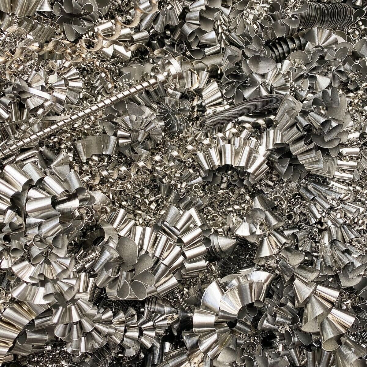stainless-steel-curly-turnings-from-a-manufacturin-2025-02-11-23-54-26-utc (1) (1) (1)